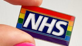 NHS rainbow pin badge