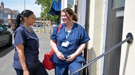 NHS workers outside building