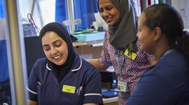 Three Berkshire Healthcare nurses talking to each other